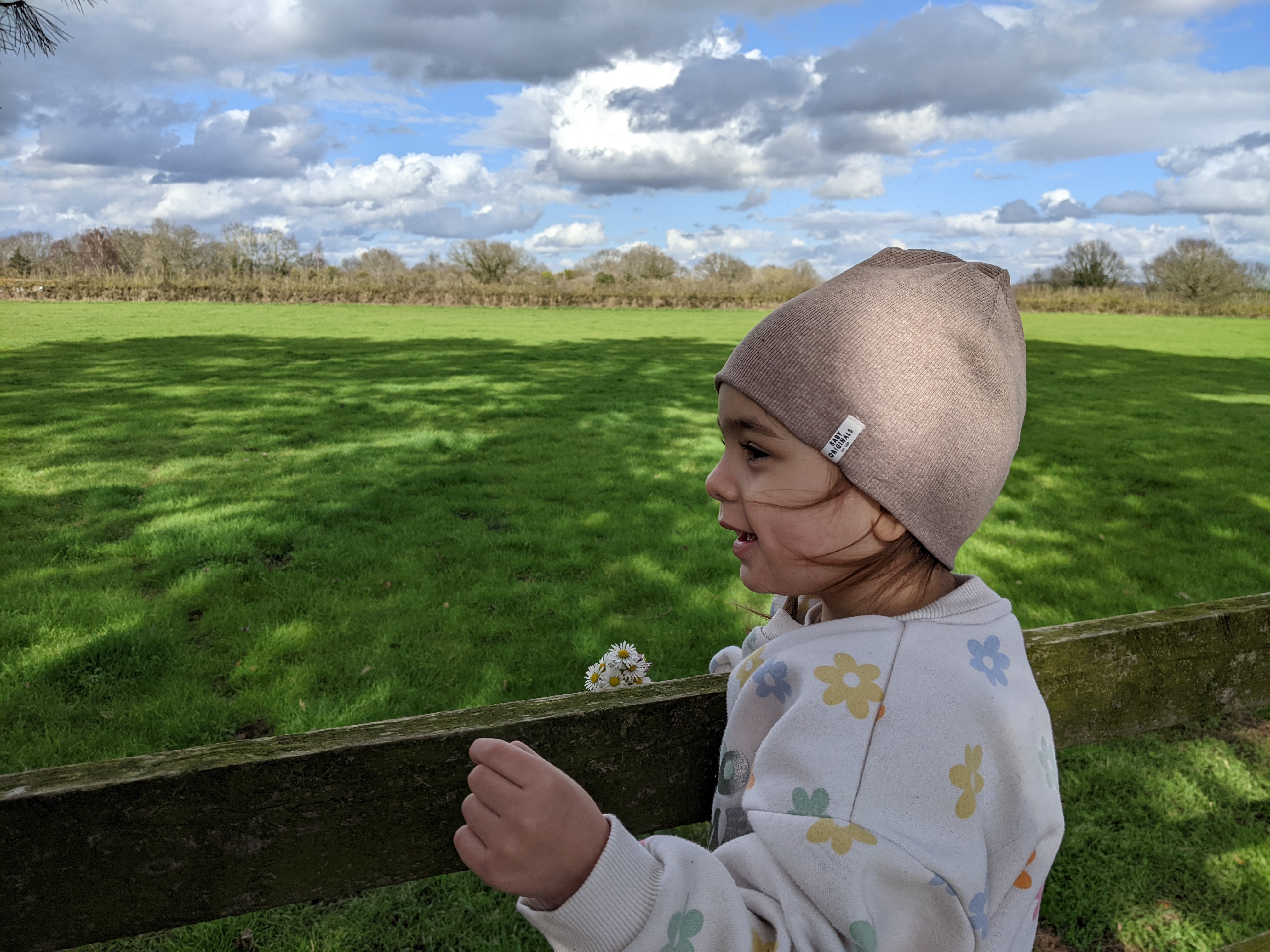 image of a little girl out in the countryside